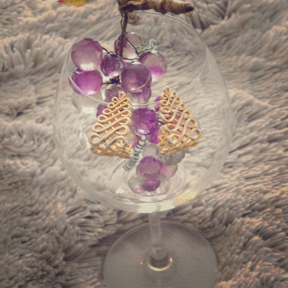 Gold hanging earrings with rope texture